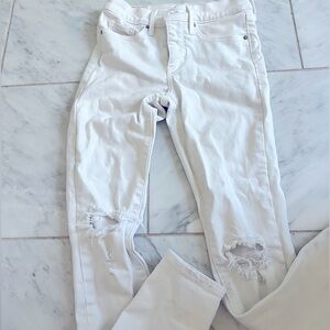 Distressed White Levi skinny shaping jeans